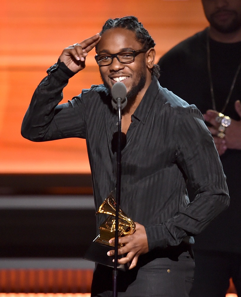 Kendrick Lamar accepting one of his 5 Grammy wins for the night