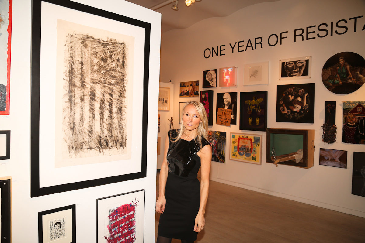 Curator Indira Cesarine at ONE YEAR OF RESISTANCE Exhibit The Untitled Space 31